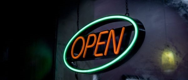 Neon "open" sign outside of a restaurant