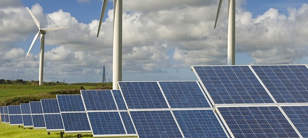 Solar panel arrays and wind turbines